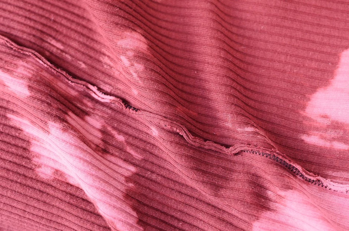 Loose, uneven seam on a shirt